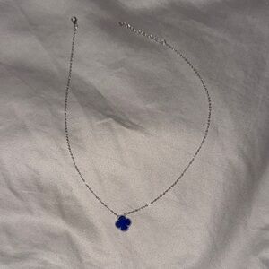 Elegant Silver Necklace with Blue Clover Pendant